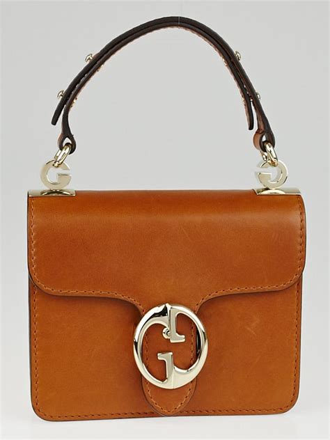 gucci 1973 collection brown leather hobo|Gucci 1973 .